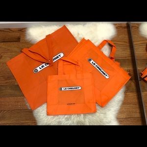 Le Creuset reusable shopping bags.